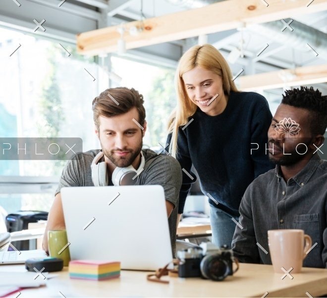 demo-attachment-683-happy-colleagues-sitting-in-office-coworking-PHYA6TG-1